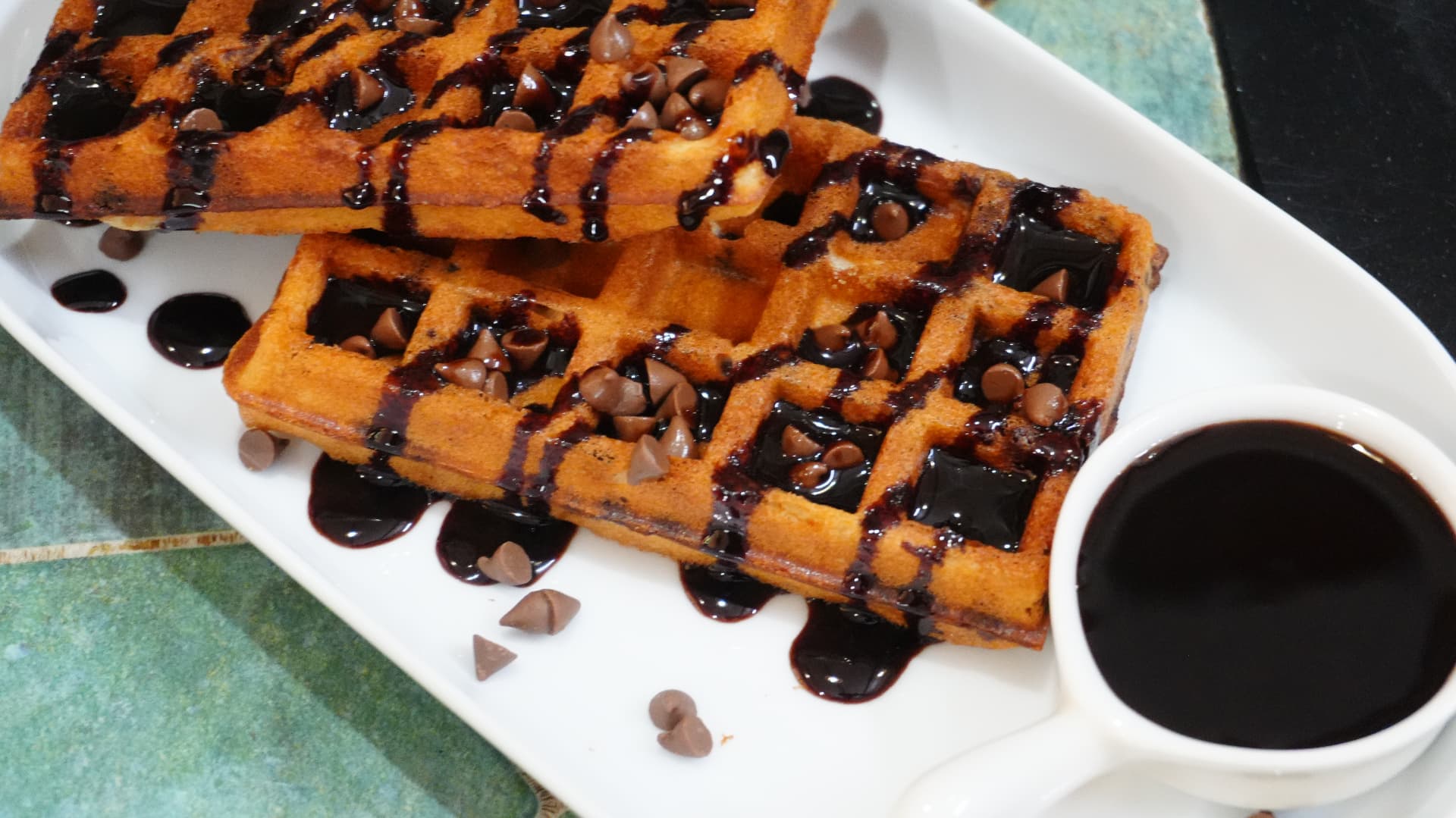 Chocolate chip waffles with chocolate sauce